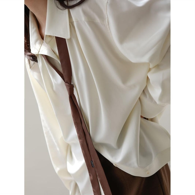 Ladies Wear A Slouchy Blouse Underneath